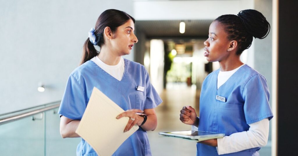 nurse with paper and nurse with tablet for hospital competency tracking