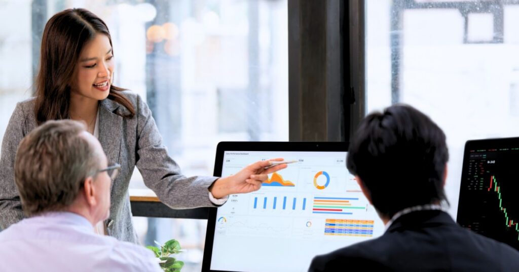 Business meeting with data presentation.